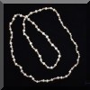 J02. Pearl necklace. 